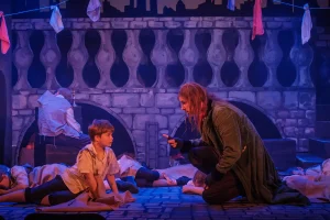 A production photo for Oliver! at Barn Theatre, Hertfordshire