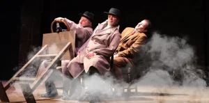 A production photo from The 39 Steps | Hall Green Little Theatre - A Little Theatre Guild Member.